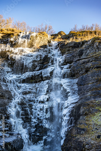Frozen waterfall in Dovrefjell in Norway