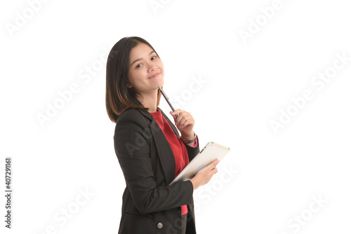 Asian business woman is holding a tablet and the other hand holding a pen and expressing joy.