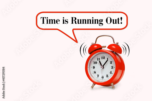 Red alarm clock and text - Time is Running Out © Superzoom