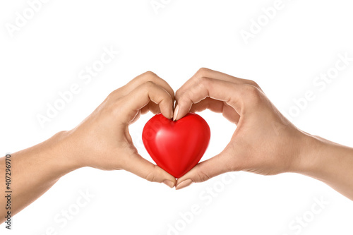 Hands with red heart on white background