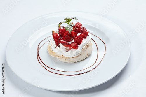 Strawberry pavlova cake on the white