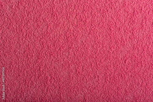 Raspberry abstract background. Rough textured pink surface