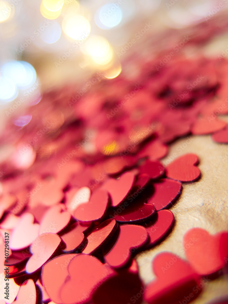 hearts confetti on the golden background hearts confetti on the golden background