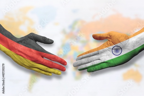 India and Germany - Flag handshake symbolizing partnership and cooperation
