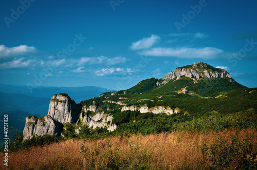 Landscape with mountains and blue sky
