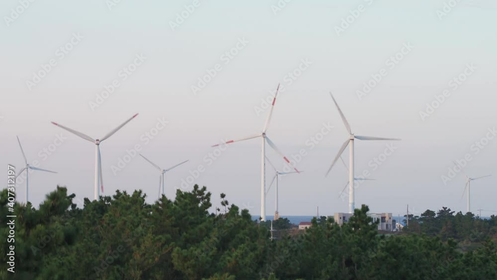 windmills in korea at sunset windmills in korea at sunset