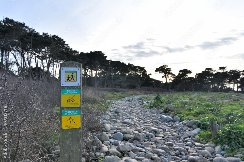 Signboard for walkers on the path in Brittany. France Signboard for walkers on the path in Brittany. France