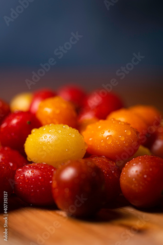 Assorted Cherry Tomatoes on Wood Cutting Board