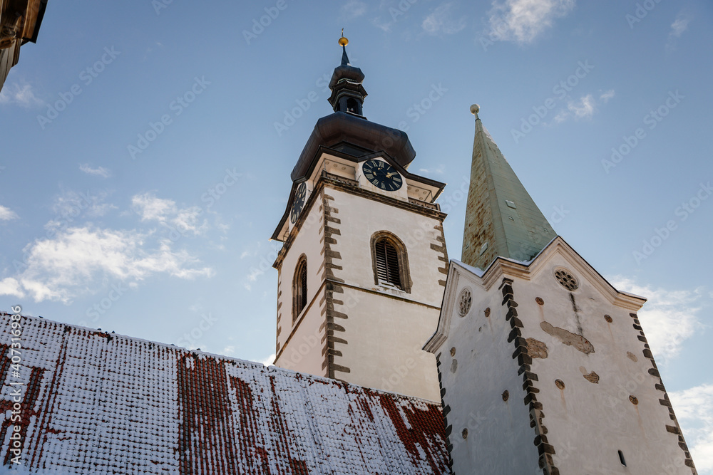 Three-nave Gothic basilica, Deanery church of the Nativity of the Blessed Virgin Mary, Architecture of medieval town, Clock tower and bell, Pisek, Southern Bohemia, Czech Republic