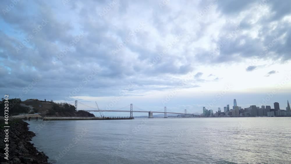 Beautiful cloudy day in San Francisco by the Bay Bridge and Treasure Island. Beautiful cloudy day in San Francisco by the Bay Bridge and Treasure Island.