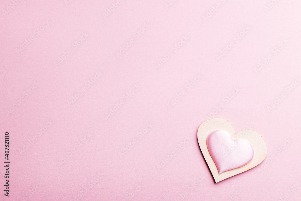 love and romance concept. heart shape isolated over pink background. above view. valentine greeting card. couple hearts conceptual