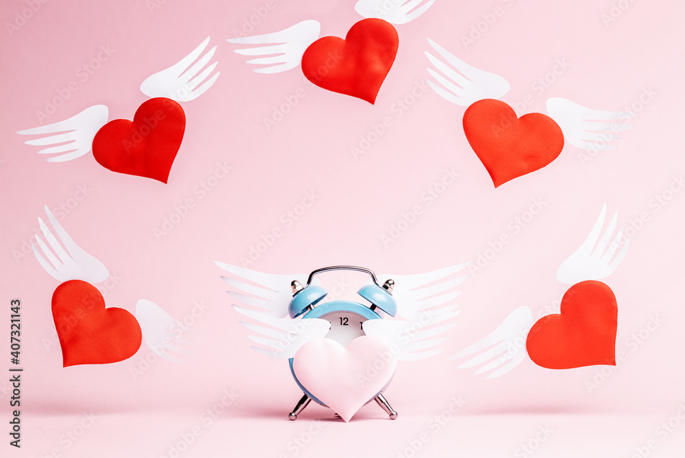 love and romance concept. flying hearts around alarm clock. frame. valentine day greeting card