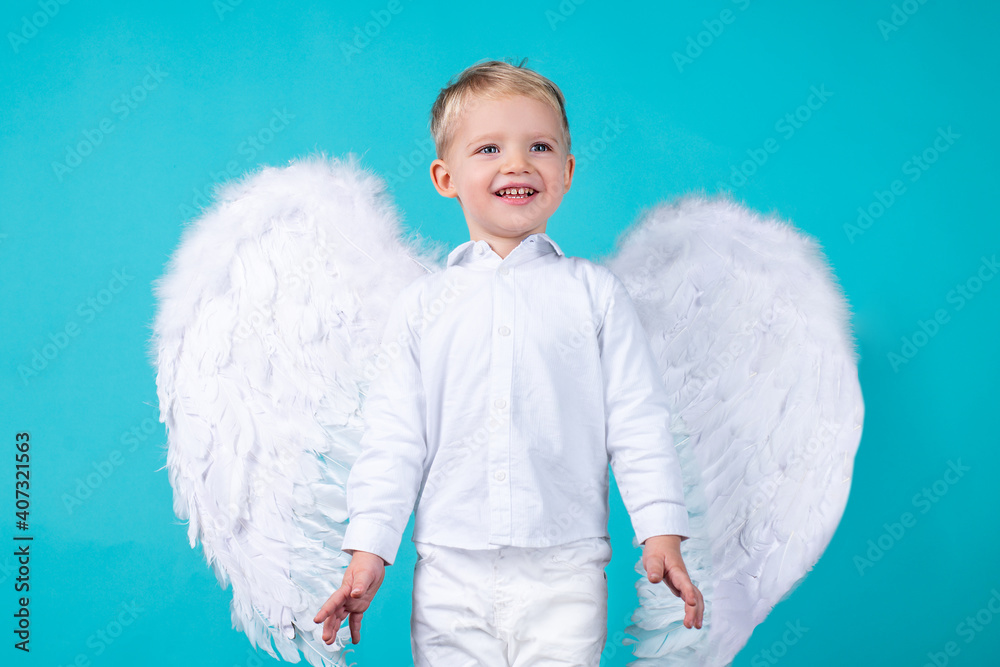 Smiling little boy kid dressed like an angel. Smiling little boy kid dressed like an angel.