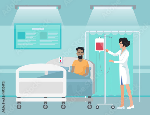 Patient making blood transfusion lying on bed in hospital. Nurse or medical assistant check pack with blood at rack. Therapy for young smiling man. Treatment in hospital. Medical healthcare concept