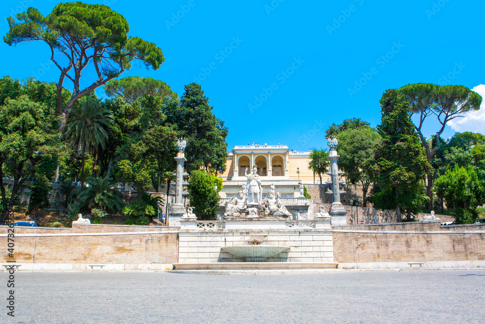 ROME, ITALY - AUGUST 26, 2016: Statues of the Goddess of Rome  fountain and the Pincio terrace in Piazza del Popolo, Rome, Italy, August 26, 2016