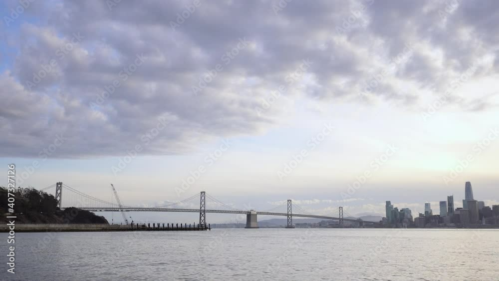 San Francisco city and Bay Bridge sunset. San Francisco city and Bay Bridge sunset.