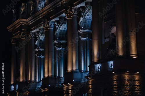 Facade of the Lviv Opera House in Ukraine at night, view from the side close-up.