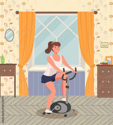 Woman doing cycling exercise. A girl with bike trainer doing sports at home near the window. Cardio workout. Exercising in the gym in the morning. Lifestyle and health. Equipment for physical activity