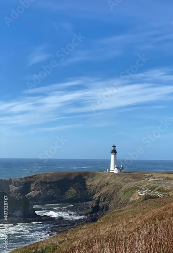 lighthouse on the coast, long shot with the ocean 