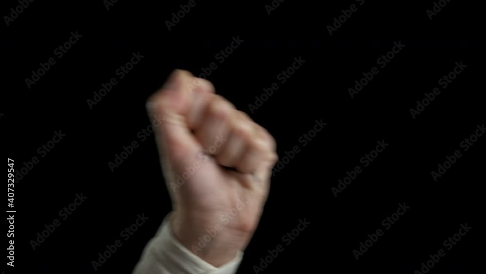 Stop racism. The inscription on the hand on a black background stop racism. Stop racism. The inscription on the hand on a black background stop racism.