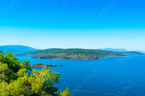 Beautiful Mediterranean landscape with Aegean sea and green hills © Myroslava