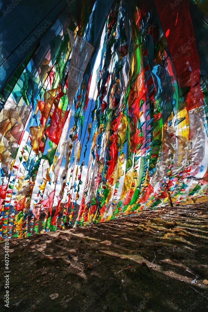 Fototapeta premium Tibet colorful prayer flag with blue sky background
