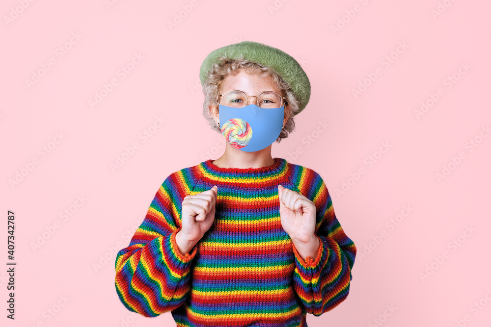 Boy wearing face mask to prevent Covid 19