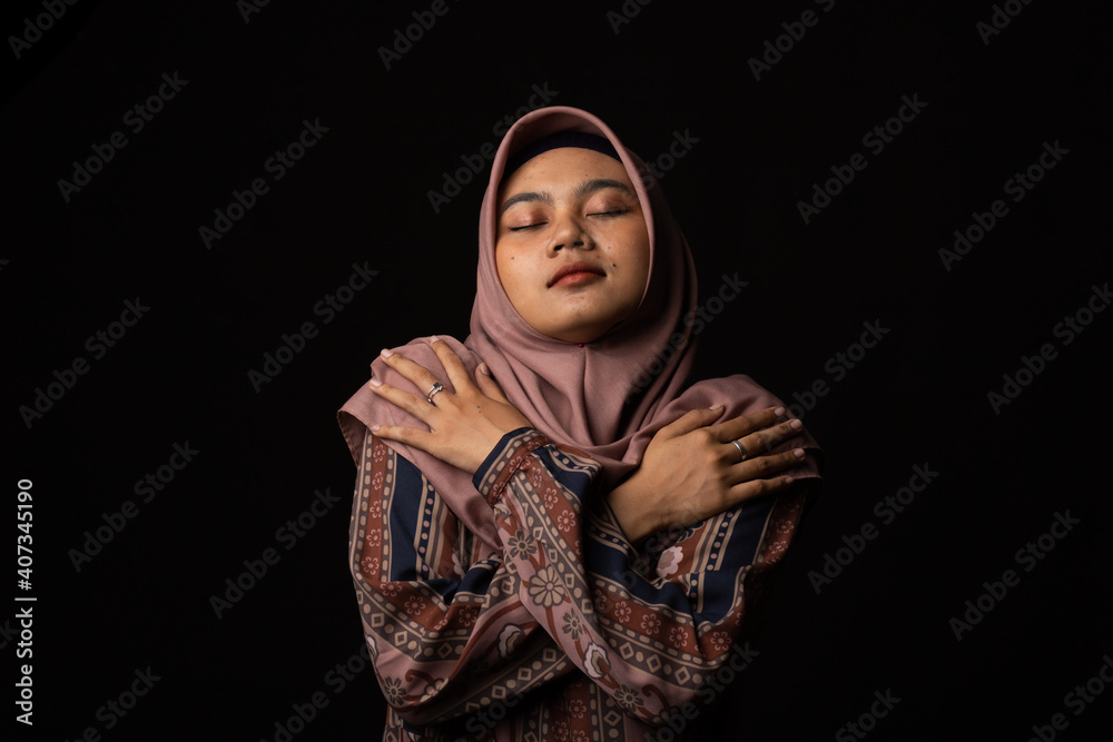 Self love concept. Butterfly hug. A psychology technique for self-soothing from anxiety and anger. A woman cross her arms and tap shoulder. Self love concept. Butterfly hug. A psychology technique for self-soothing from anxiety and anger. A woman cross her arms and tap shoulder.