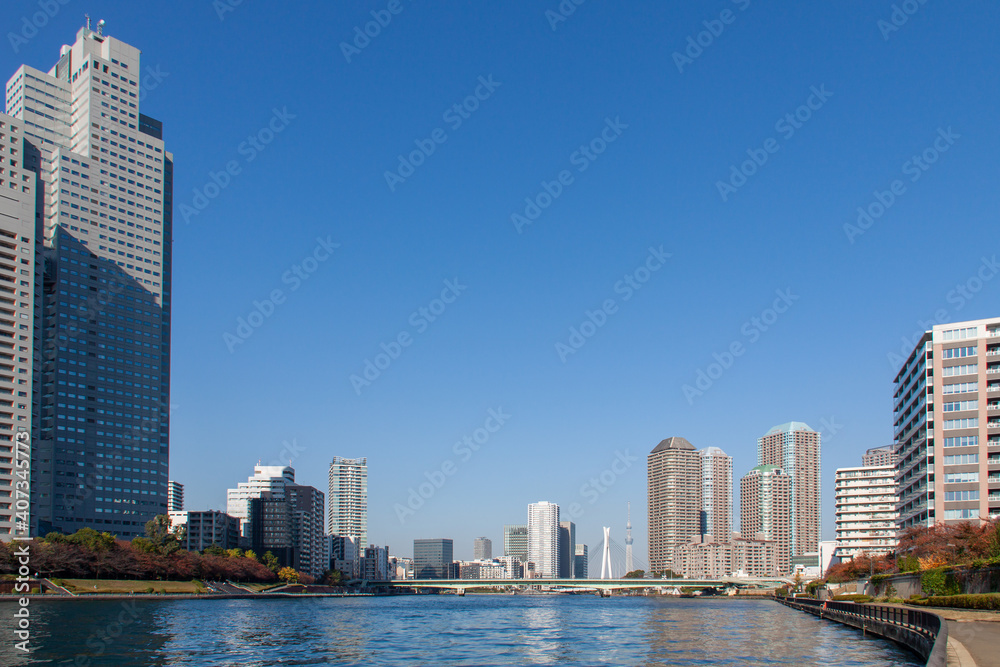 Tokyo Cityscape and the Sumida River against the Blue Sky