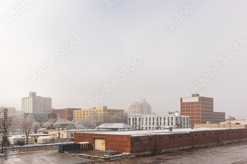 City skyline on a foggy snowy winter morning