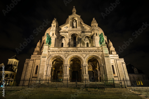 A long exposure image of Sacre Coeur cathedral in Paris at night