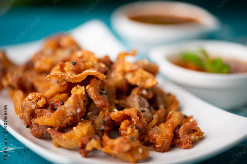 Crispy fried sliced belly pork with spicy sauce Crispy fried sliced belly pork with spicy sauce