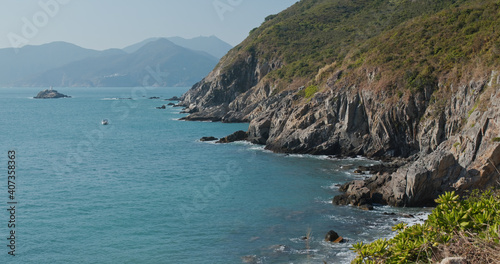 Tropical island with blue sky and sea © leungchopan