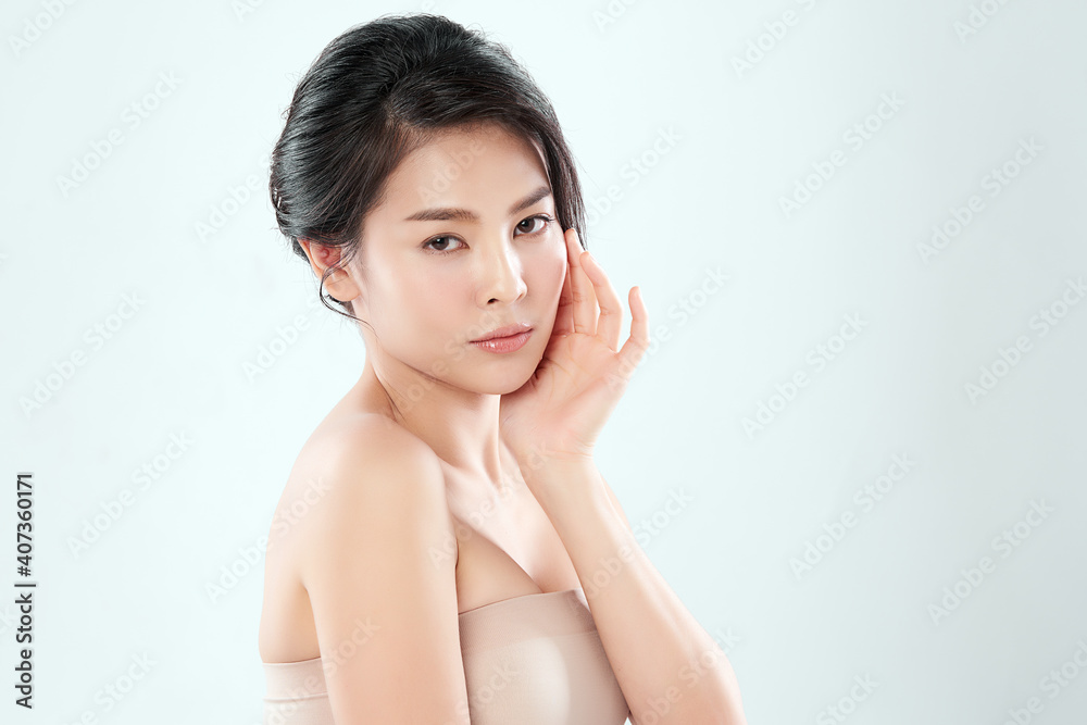 Beautiful young asian woman with clean fresh skin on white background, Face care, Facial treatment, Cosmetology, beauty and spa, Asian women portrait Beautiful young asian woman with clean fresh skin on white background, Face care, Facial treatment, Cosmetology, beauty and spa, Asian women portrait