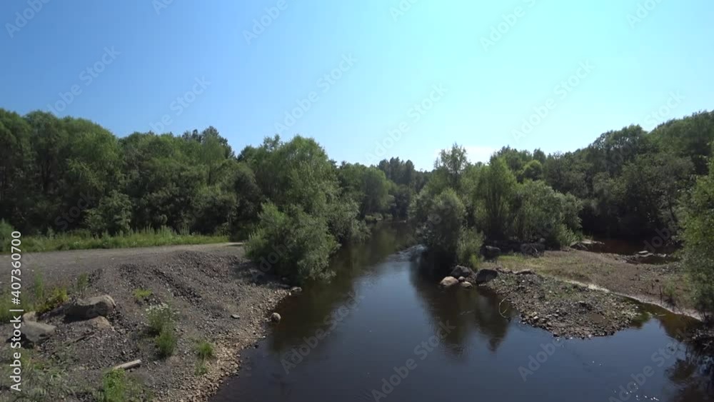 Mountain river, view from the bridge, water flow Mountain river, view from the bridge, water flow
