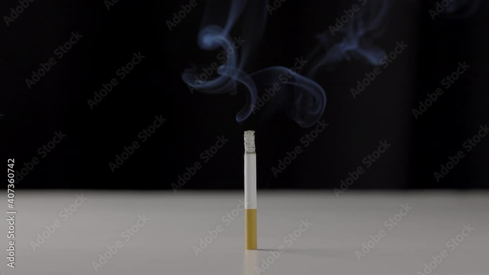 One of the burned cigarettes was burning. Gradually dissipated, there was a lot of smoke floating around. One of the burned cigarettes was burning. Gradually dissipated, there was a lot of smoke floating around.