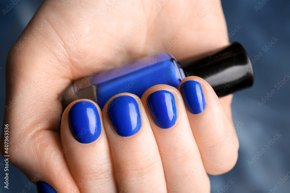 Female hand with beautiful manicure and nail polish, closeup Female hand with beautiful manicure and nail polish, closeup