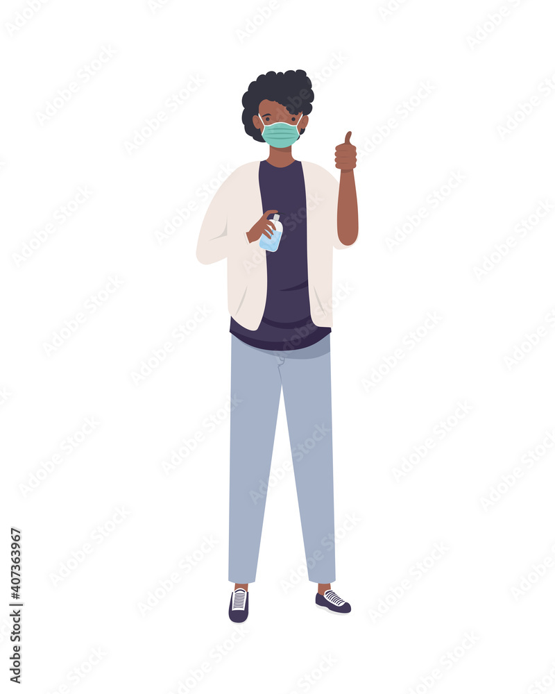 covid prevention, young man afro wearing medical mask with bottle antibacterial in hands covid prevention, young man afro wearing medical mask with bottle antibacterial in hands