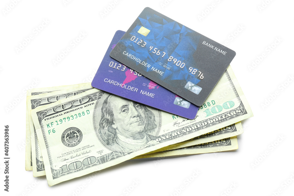 Credit cards with dollar banknotes on white background