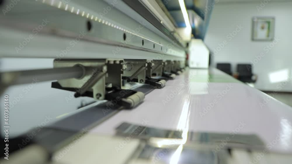 Wide digital printing on self adgesive film. Flex printing machine Wide digital printing on self adgesive film. Flex printing machine