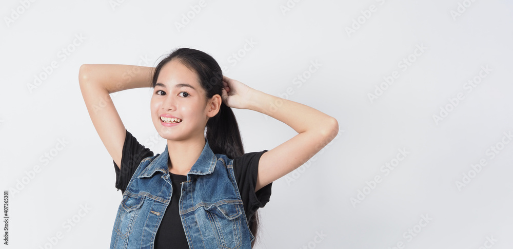 Gesture posing. Asian Young woman on white background cheerful and confident showing gestures. such as mini heart Okay Thumb up or point out. very happy amazed excited and surprised, Jacket jeans. Gesture posing. Asian Young woman on white background cheerful and confident showing gestures. such as mini heart Okay Thumb up or point out. very happy amazed excited and surprised, Jacket jeans.