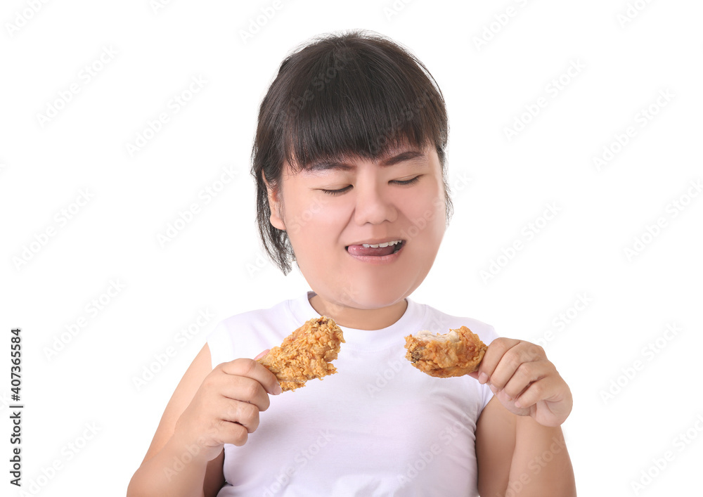 Big head the fat woman is holding junk food in her hand and enjoy eating diet of healthy concept Big head the fat woman is holding junk food in her hand and enjoy eating diet of healthy concept
