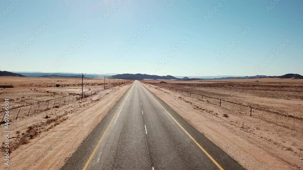Namibian Road in Kalahari Desert in Africa. Aerial Drone Shot. Lanscape of the Road in the Desert