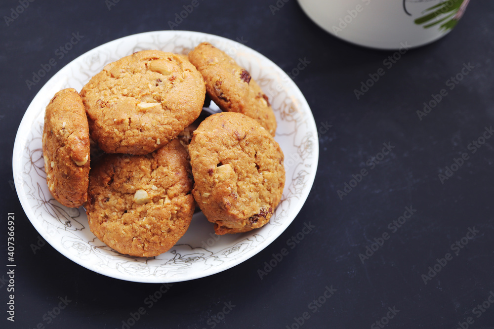 Homemade oatmeal cookies on black background. Homemade oatmeal cookies on black background.
