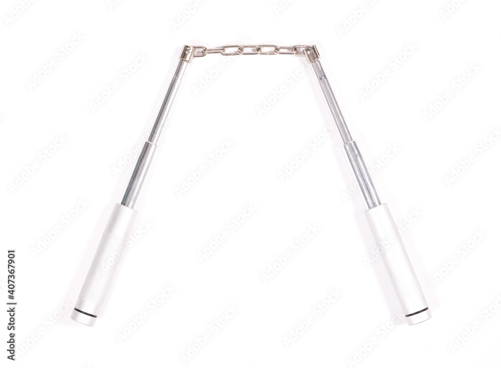 Metal karate sticks or nunchuks isolated on white Metal karate sticks or nunchuks isolated on white