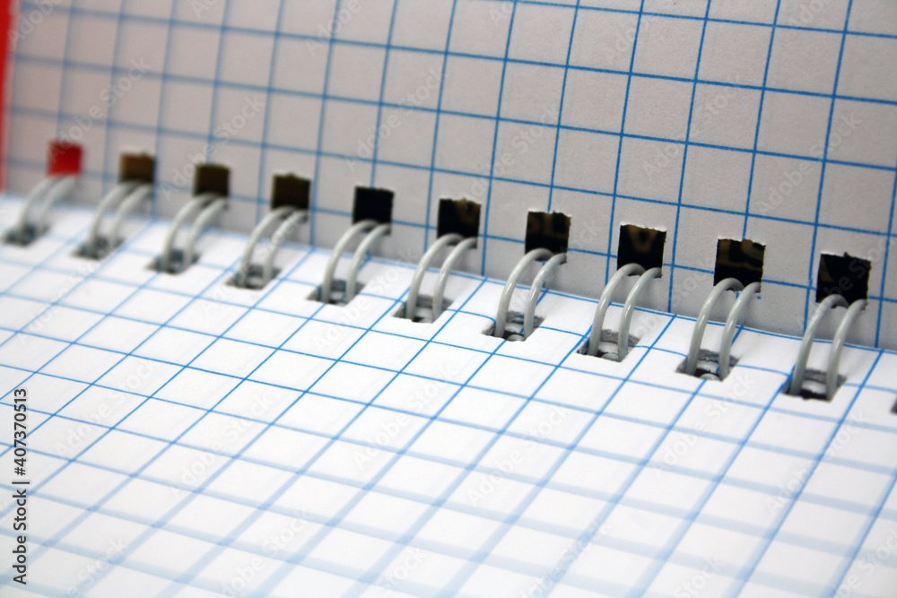 Notepad for notes and sketches on a red background.