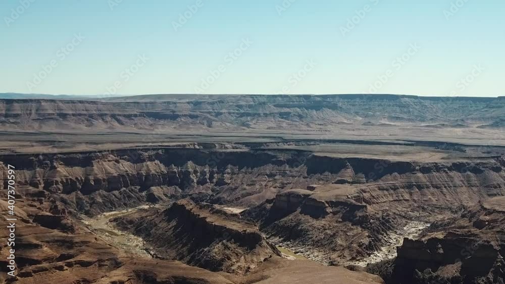 Fish River Canyon in Namibia, Africa Aerial Drone Shot. Lanscape of the the Largest Canyon in Africa. View From Above Camera Moves Sideward Fish River Canyon in Namibia, Africa Aerial Drone Shot. Lanscape of the the Largest Canyon in Africa. View From Above Camera Moves Sideward