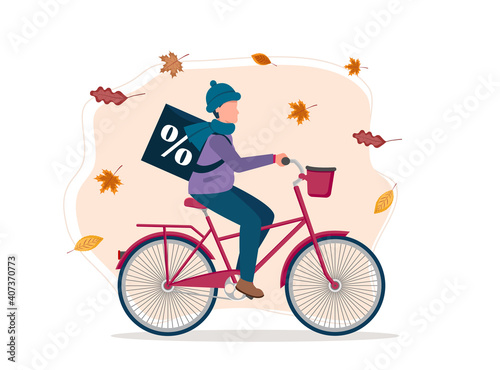 Autumn discounts. Young guy rides a bike with a backpack with discounts. Vector illustration