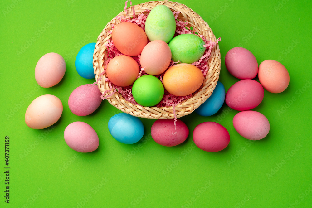Easter eggs in a nest on green background Easter eggs in a nest on green background