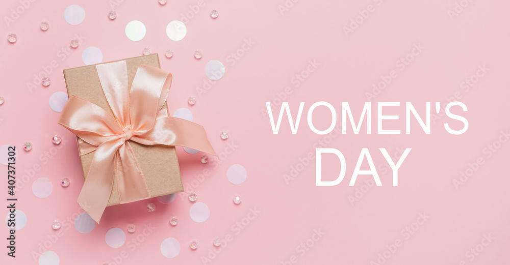 Gifts on pink background, love and valentine concept with text Womens Day
